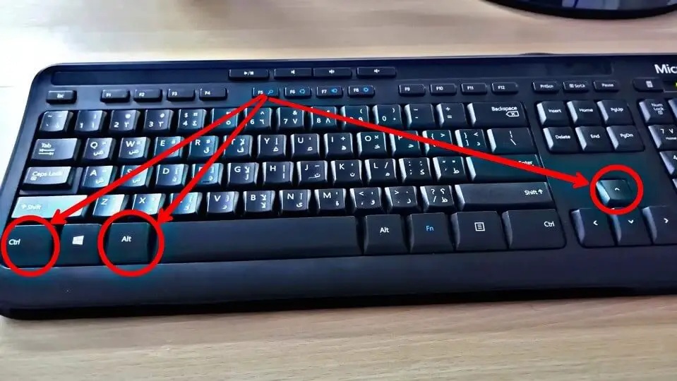 أزرار Ctrl + Alt + Up Arrow في لوحة المفاتيح